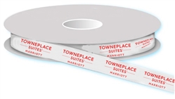 TownePlacel Suites custom-printed 5/8" wide, white double face satin ribbon with metallic black logo. Price is per roll/100 yards, #1221725