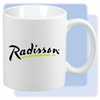 Radisson 11-ounce C-handle white ceramic coffee mug with black and green Radisson  logo. Perfect for meeting rooms or as low-cost gifts. Minimum order: 72 pcs.