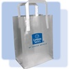 Cambria Suites frosted shopping bag. High-density frosted plastic bag with fused handles and cardboard bottom insert.