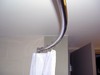 Curved shower curtain rod, bright stainless finish, #712-01-C9689